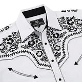 White western shirt collar detail with black floral embroidery and snap button placket