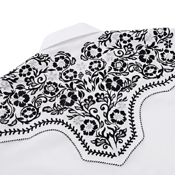 White western shirt with black and grey floral embroidery covering the back yoke and shoulders, finished with a scalloped hem
